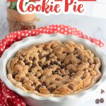 baked and uncut chocolate chip cookie pie in a pie plate.