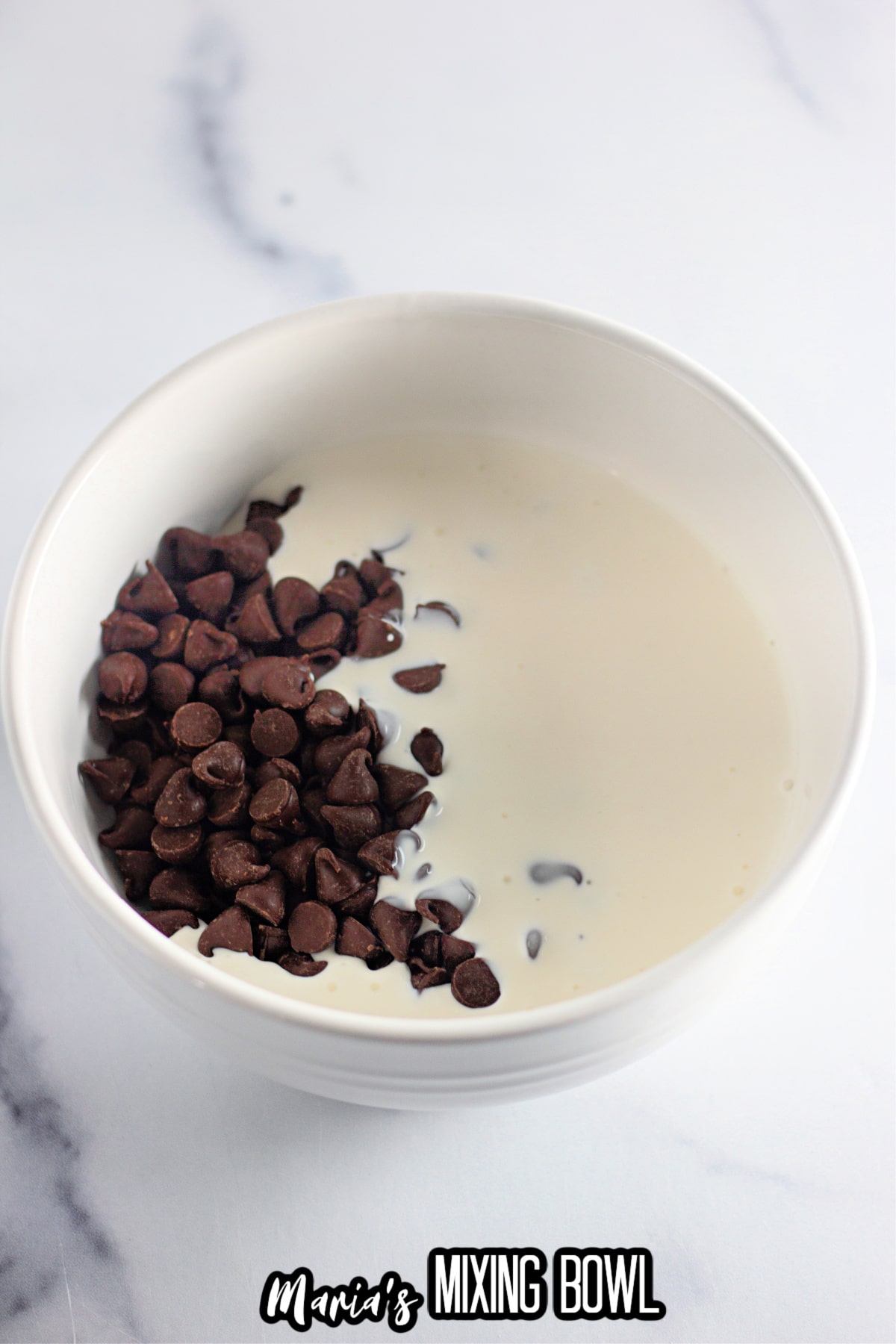 chocolate chips and heavy cream in a small bowl.
