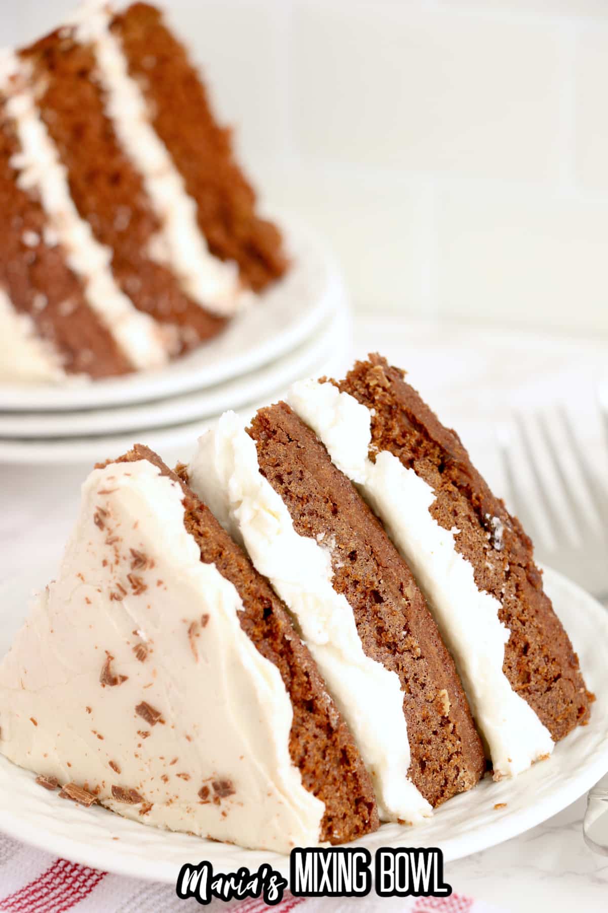 slice of naked chocolate cake on a plate.