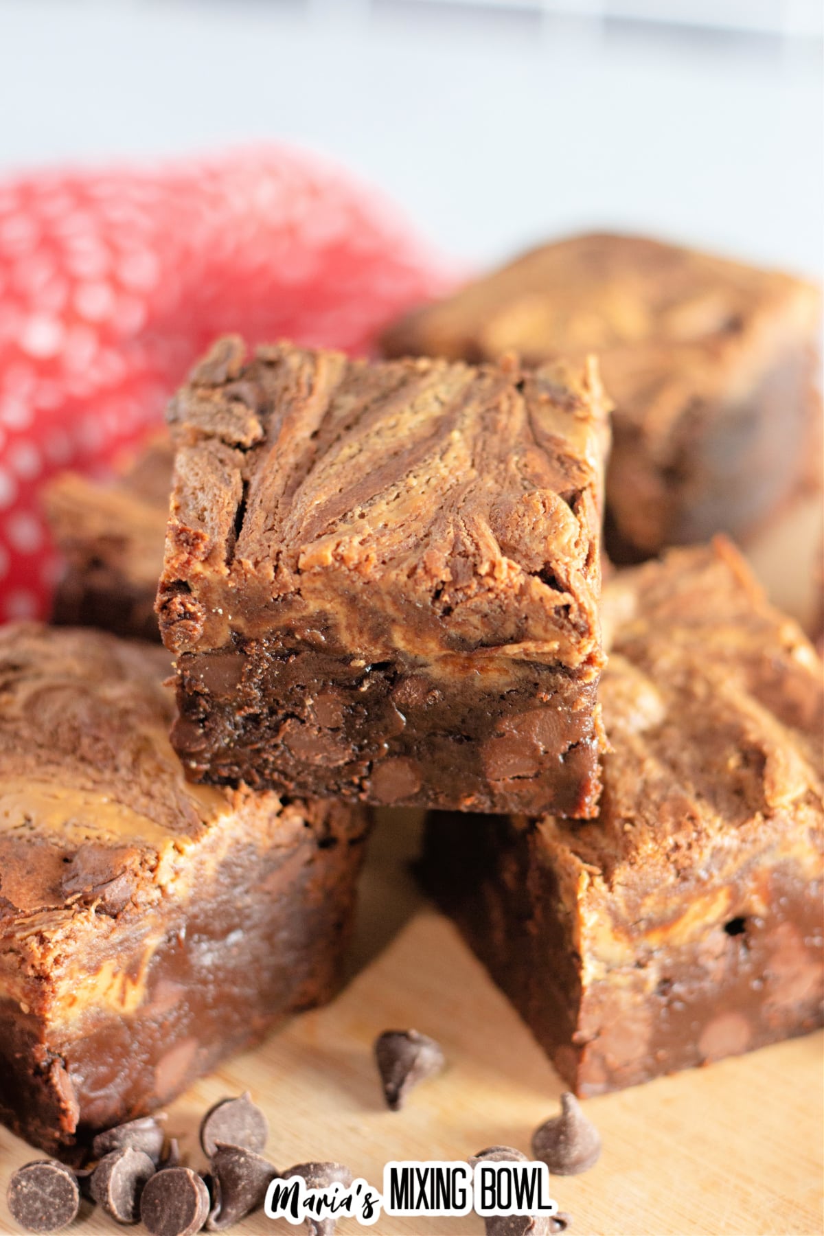 peanut butter chocolate brownies stacked on top of each other.