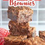 peanut butter chocolate chip brownies stacked on a counter.