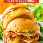 two slow cooker pizza sloppy joes on a white plate.