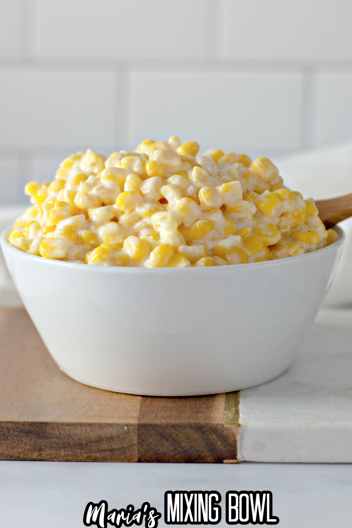 bowl filled with slow cooker creamy corn.