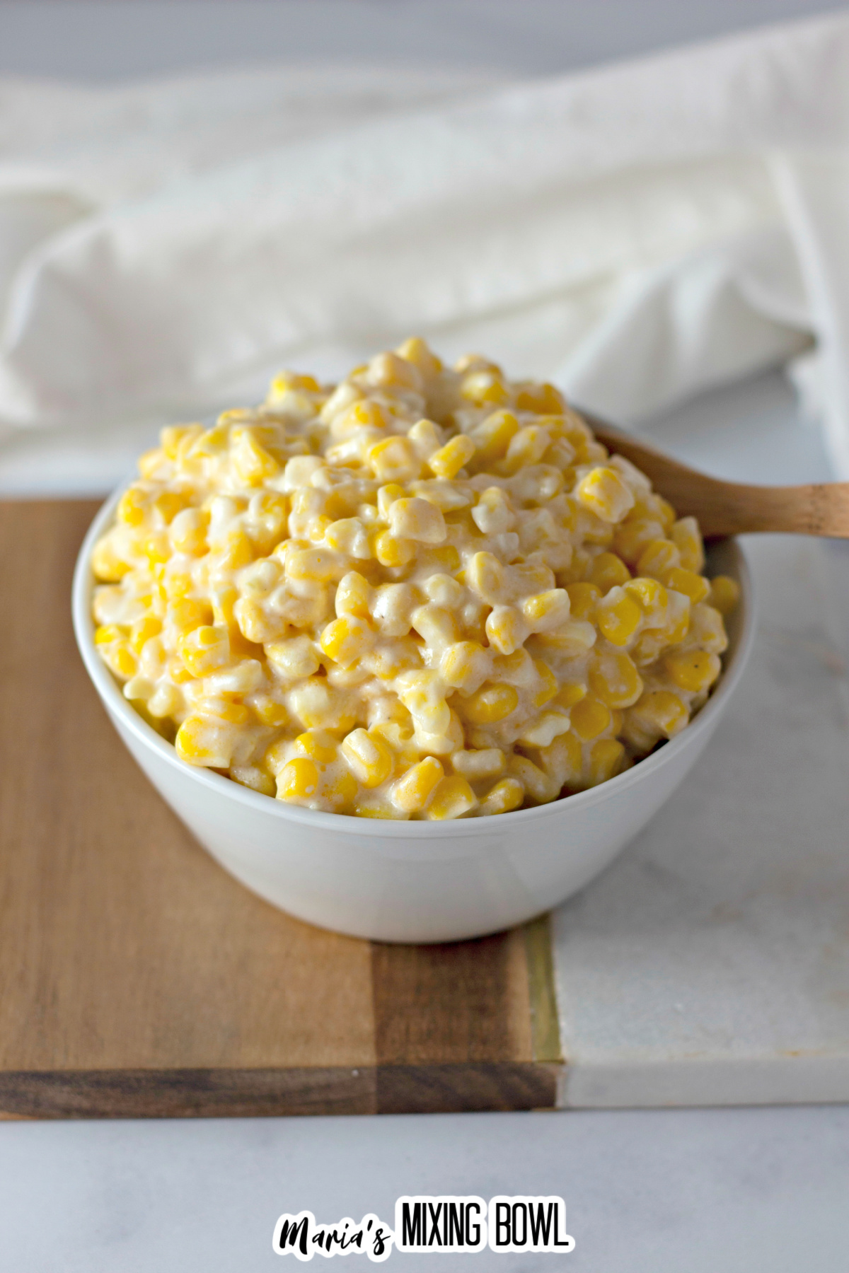 bowl filled with slow cooker creamy corn.