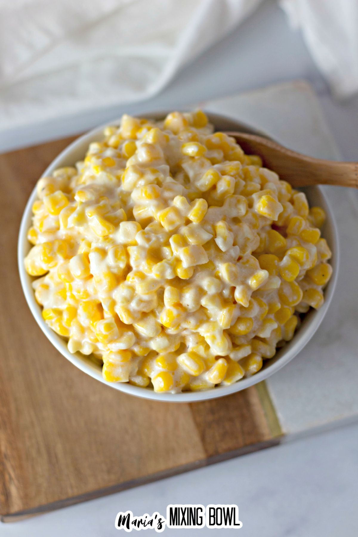 bowl filled with slow cooker creamy corn.