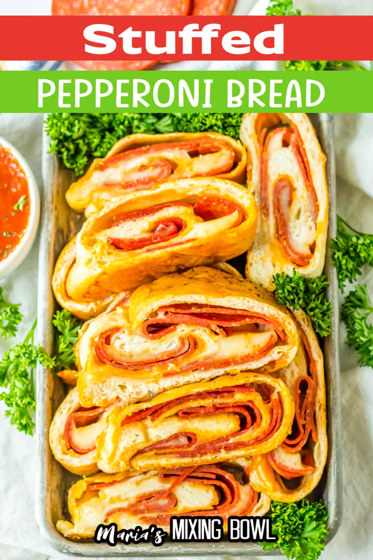 slices of stuffed pepperoni bread on a metal serving tray.