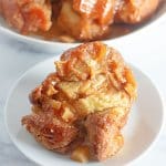 slice of apple pie monkey bread on a plate.