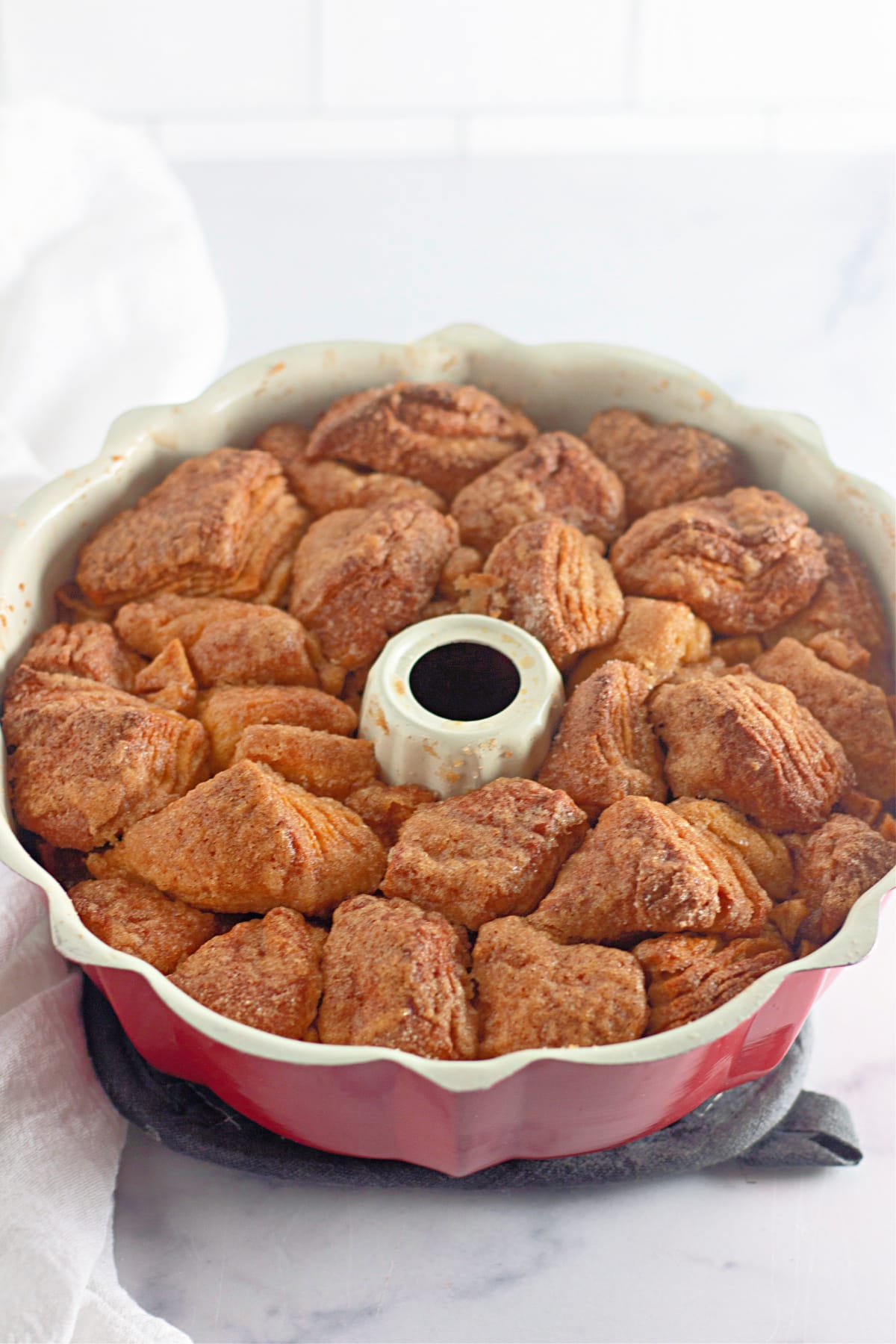 baked apple pie monkey bread in a bundt pan.
