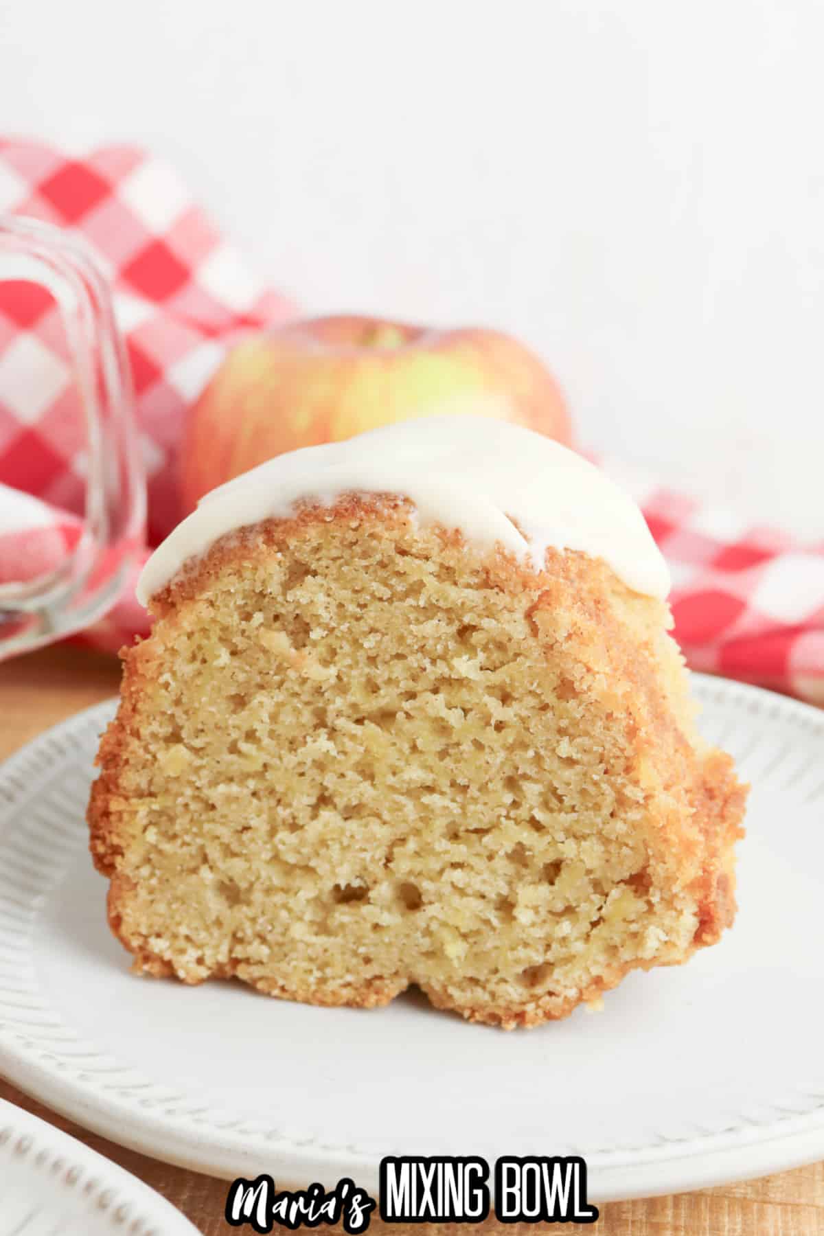 slice of apple spice bundt cake on a small plate.