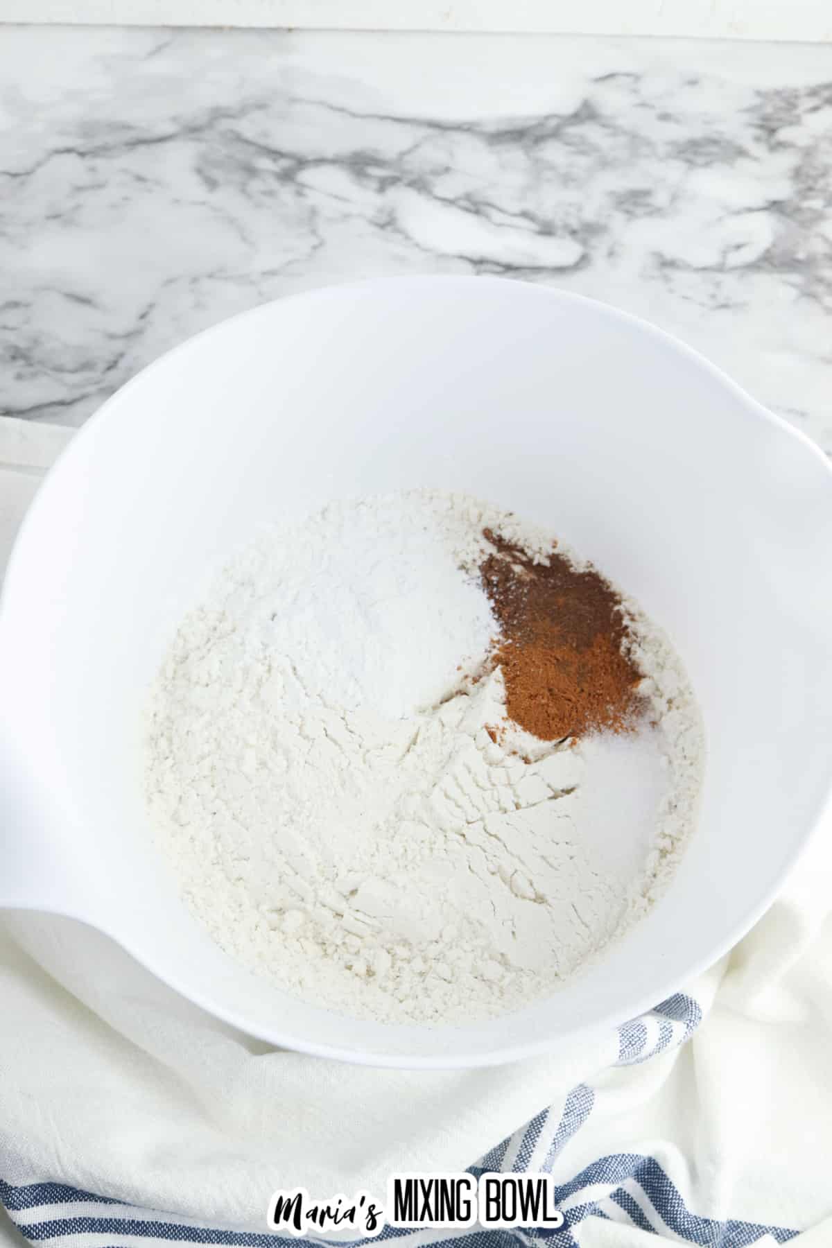 flour, baking powder, salt, and spices in a large bowl.