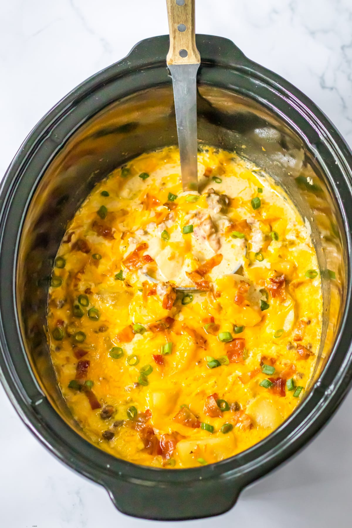 cooked bacon cheeseburger soup in a slow cooker.
