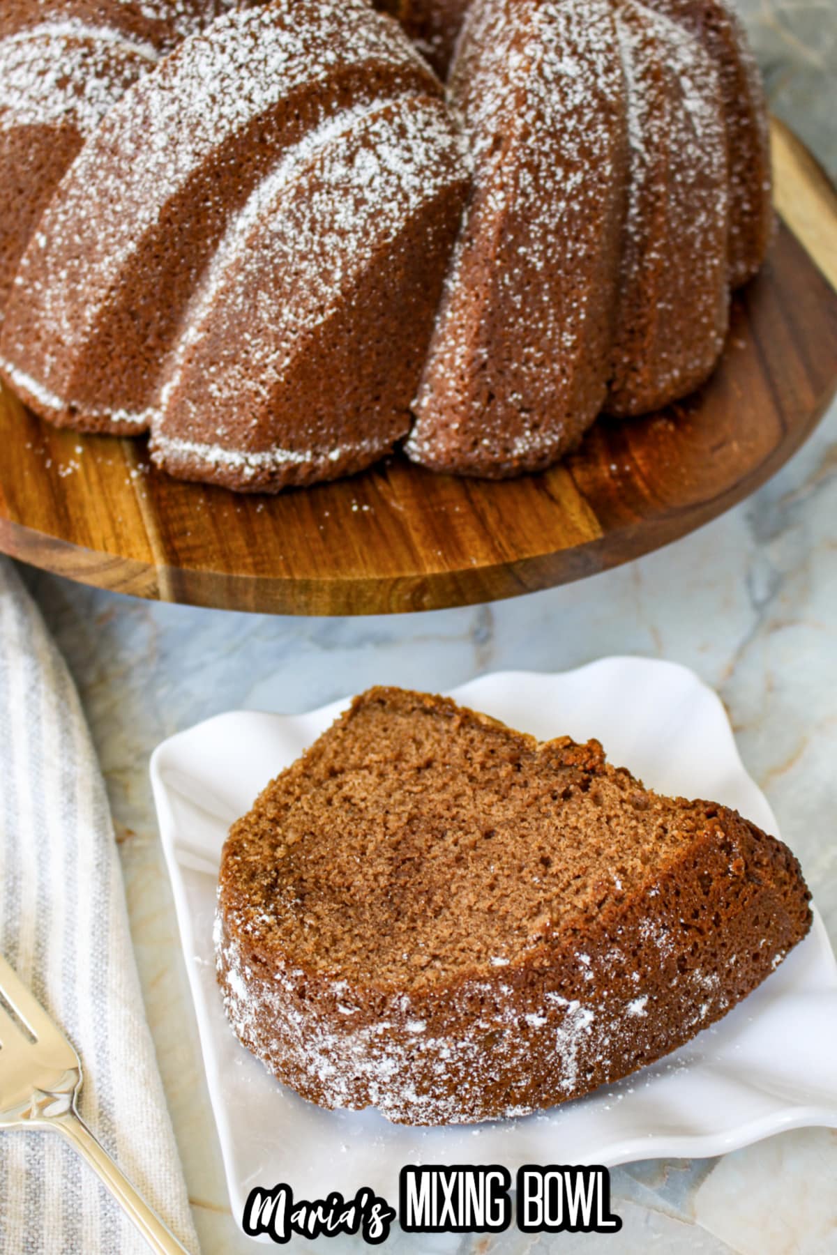 slice of buttermilk chocolate bundt cake on a plate.