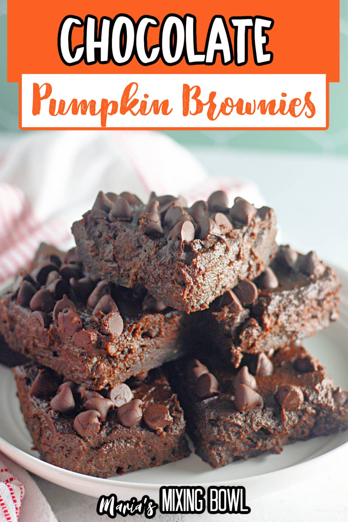 stack of chocolate pumpkin brownies on a plate.
