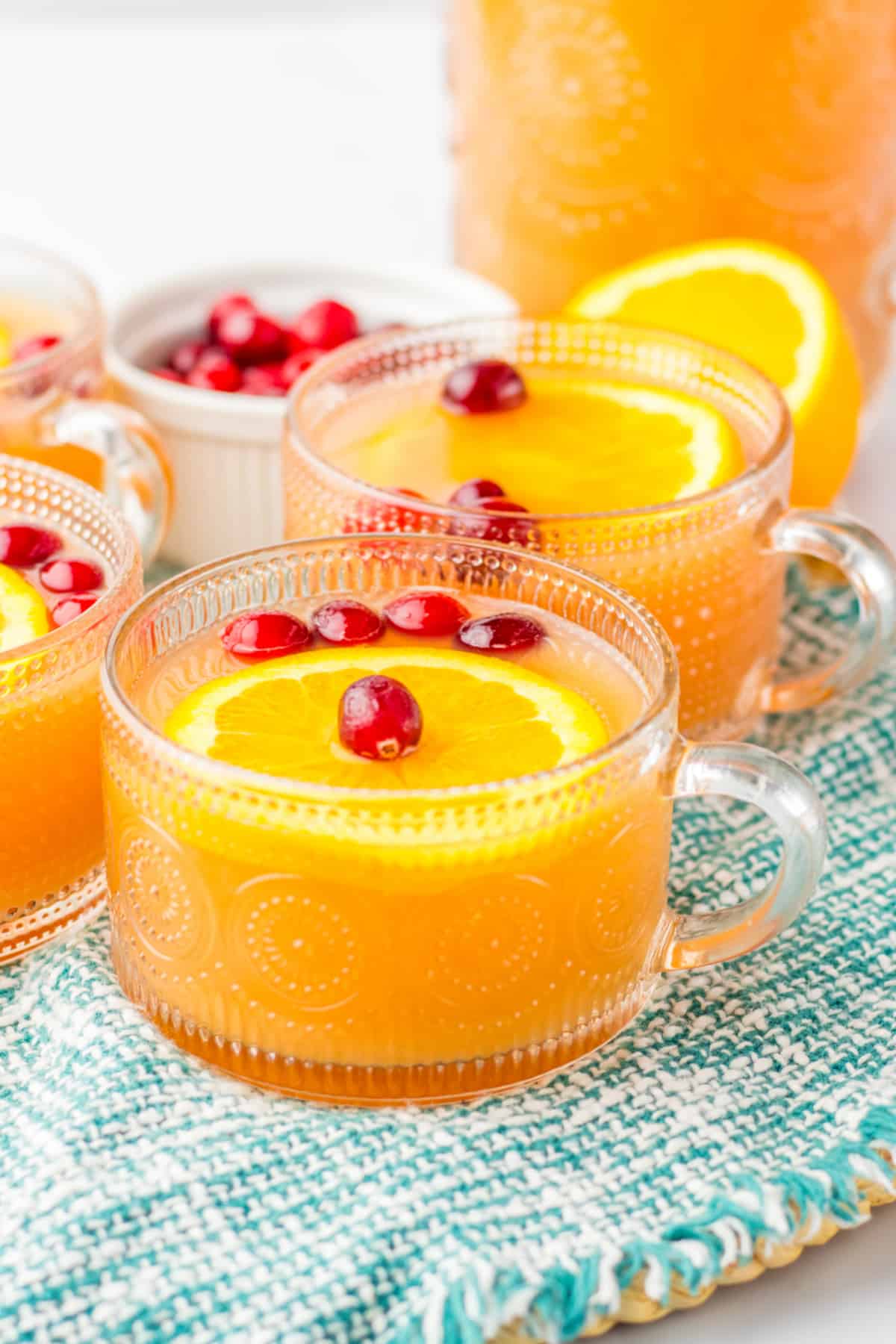 glass mug full of christmas morning punch.