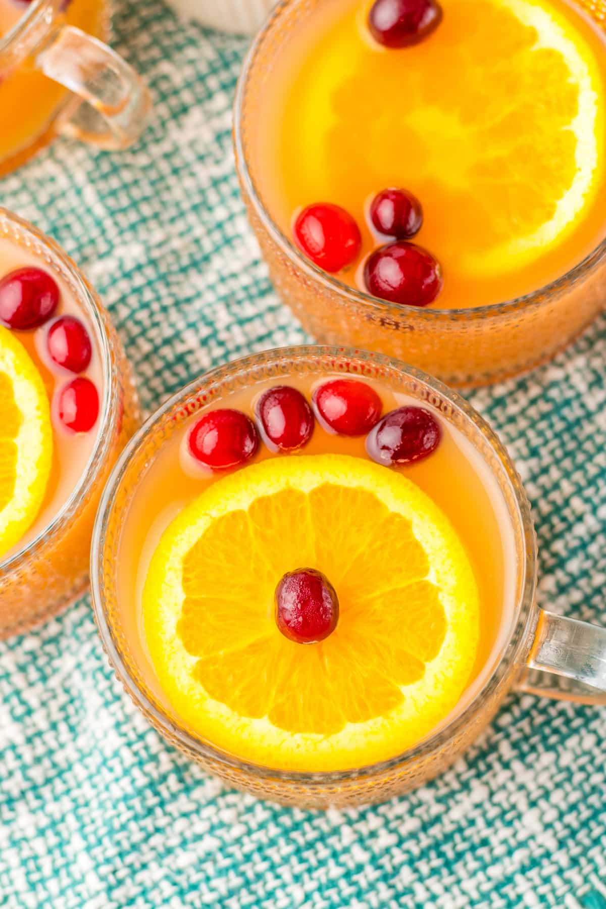 glass mug full of christmas morning punch.