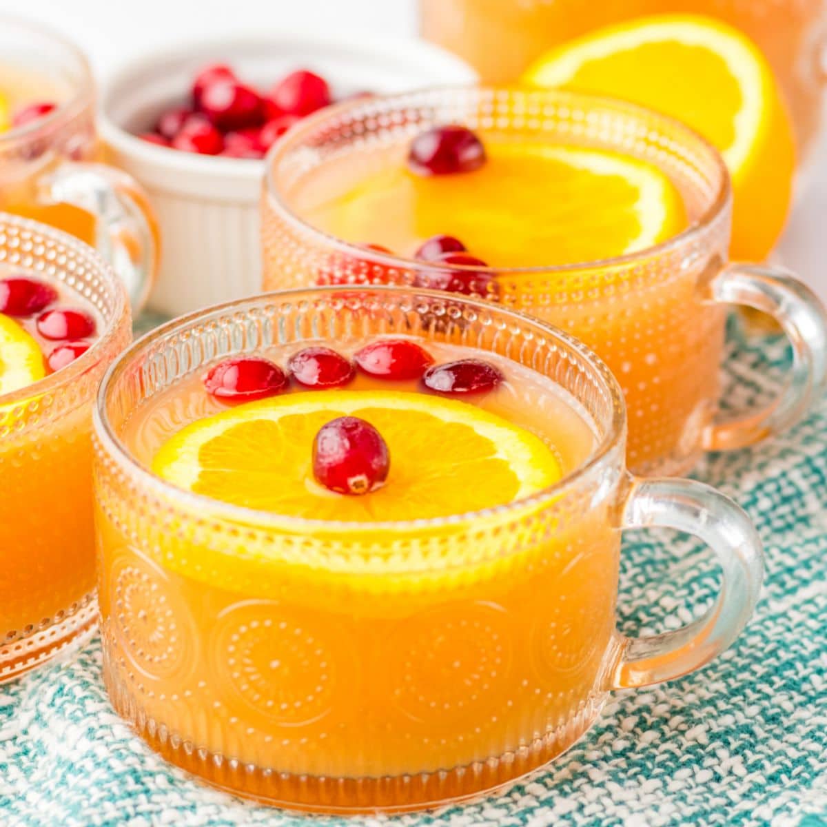 glass mug full of christmas morning punch.
