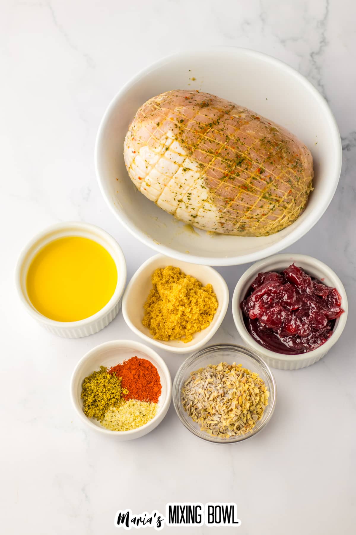 bowls of turkey roast, cranberry sauce, seasonings, and orange juice and brown sugar.