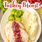 slices of cranberry turkey roast, mashed potatoes and steamed brussels sprouts on a plate.
