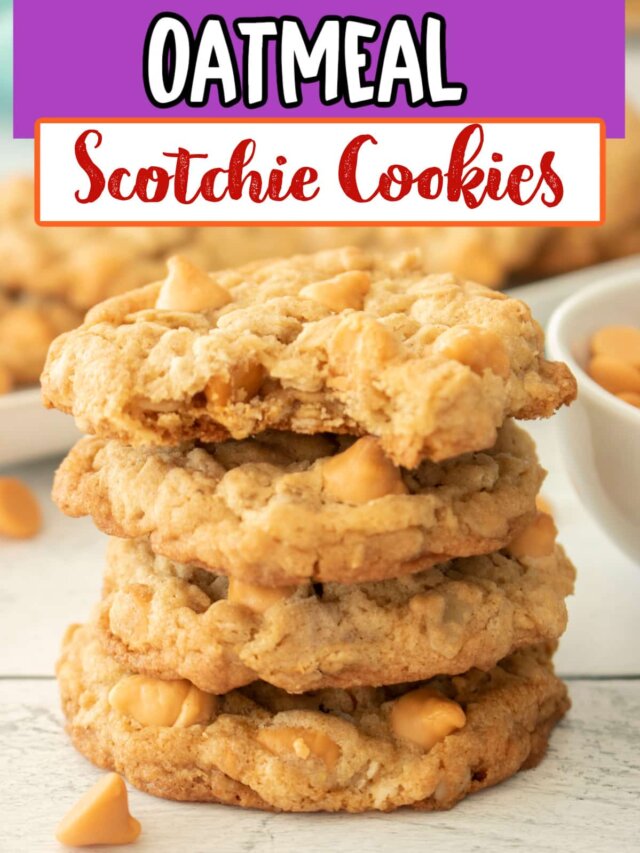 stack of four oatmeal scotchies cookies on a plate the top one has a bite missing.
