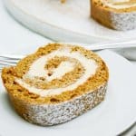 slice of gingerbread cake roll on a plate.