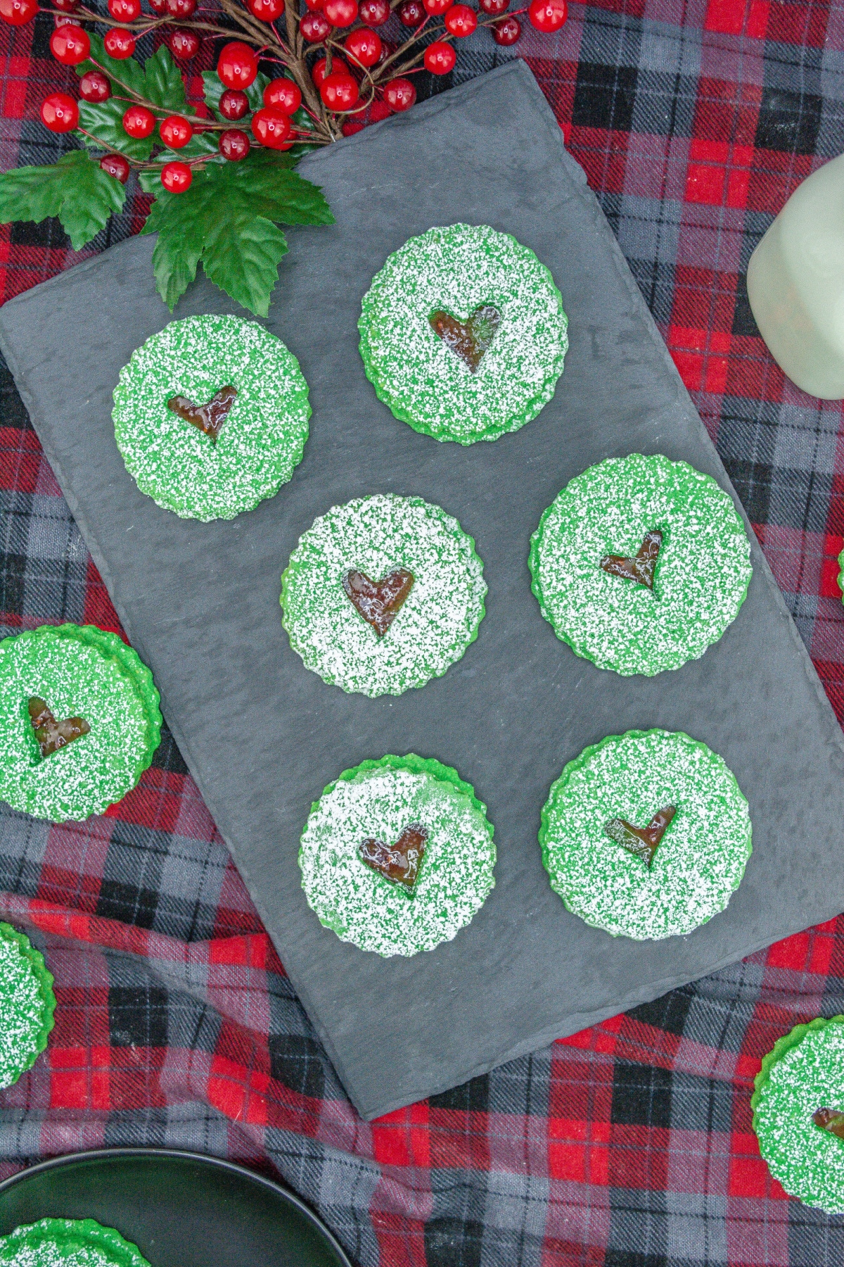 six grinch linzer cookies or a marble cutting board.