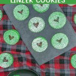six grinch linzer cookies or a marble cutting board.