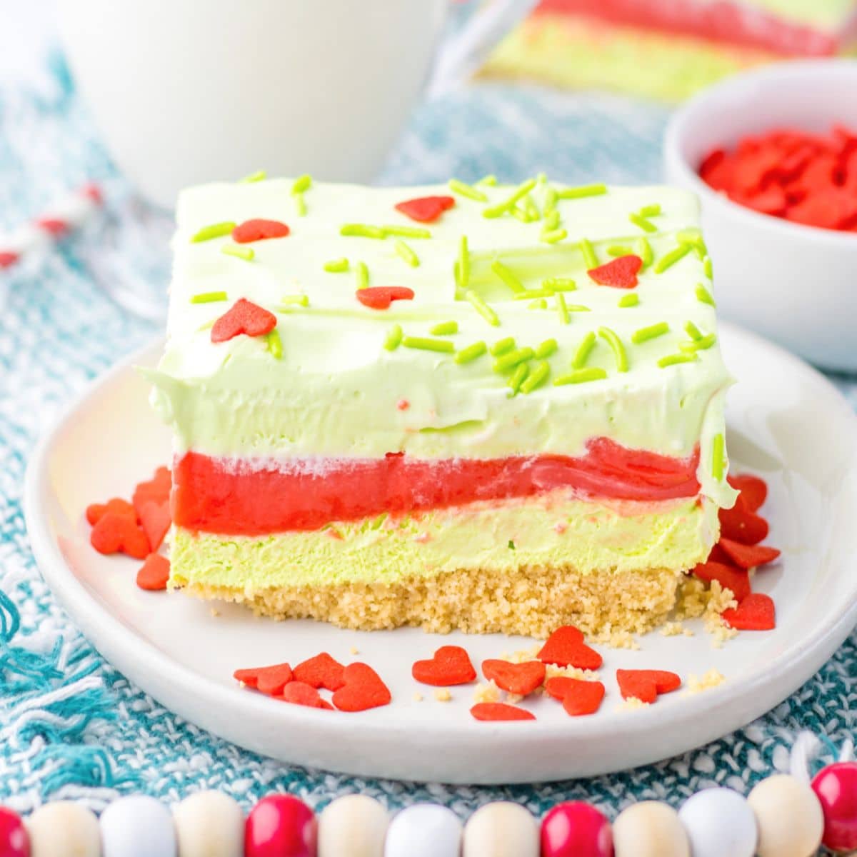 slice of grinch lush on a small plate.