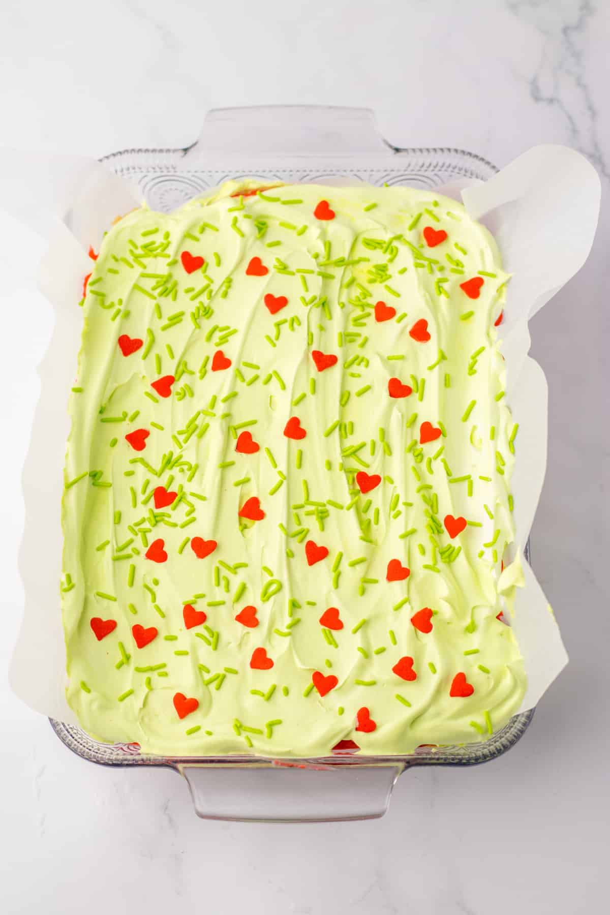 finished grinch lush in a glass baking dish.