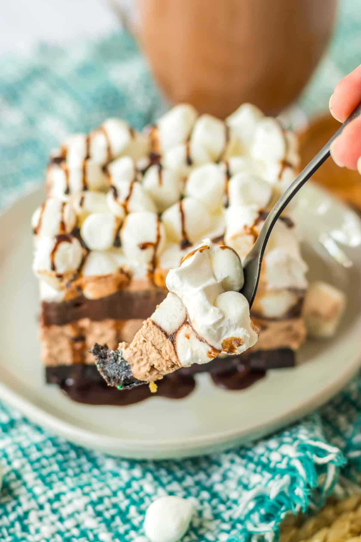 bite of hot chocolate lush on a fork held in the air.