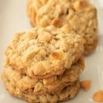 stack of three oatmeal scotchies cookies on a plate.