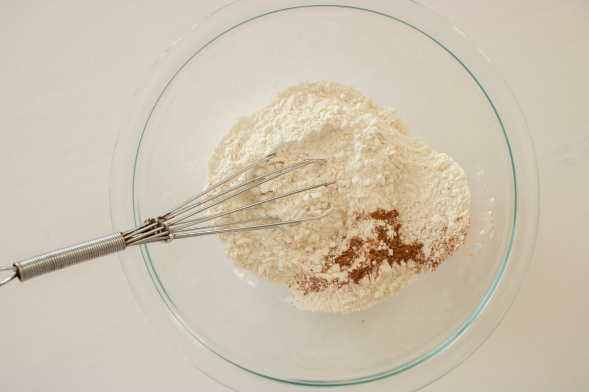 flour, salt and ground cinnamon in a glass mixing bowl.