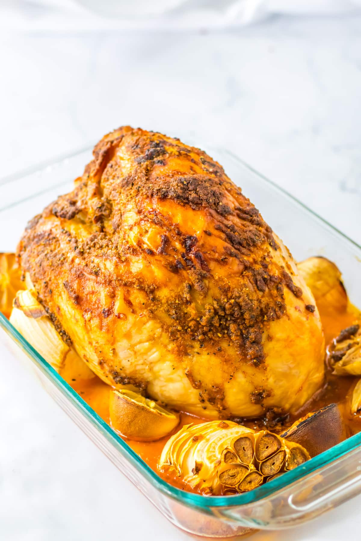 turkey breast that has been roasted in a glass baking dish.