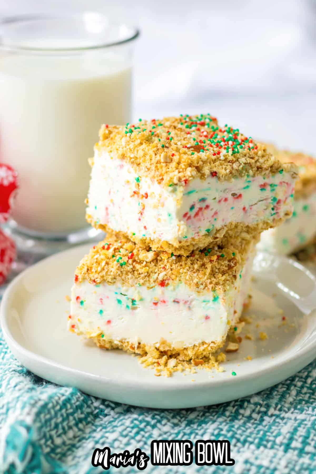 two slices of peppermint crunch cake on a plate.
