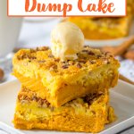 two slices of pumpkin crunch dump cake stacked on a plate with a scoop of ice cream on top.