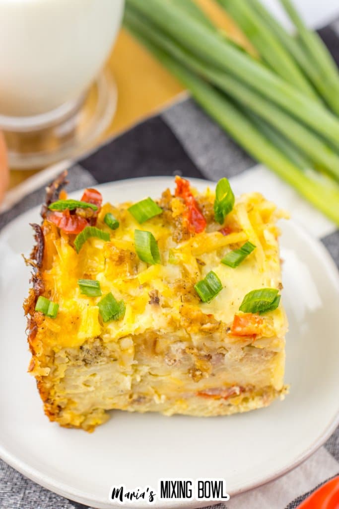 slice of slow cooker breakfast casserole on a plate.