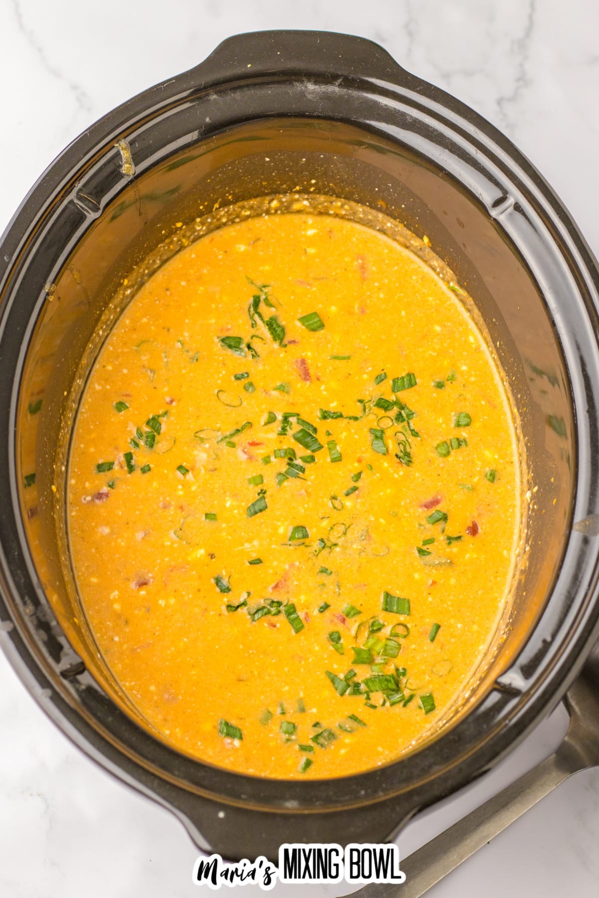 finished buffalo chicken chili in the slow cooker.