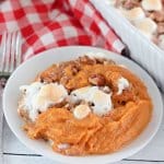 plate of sweet potato casserole with pecan streusel topping.