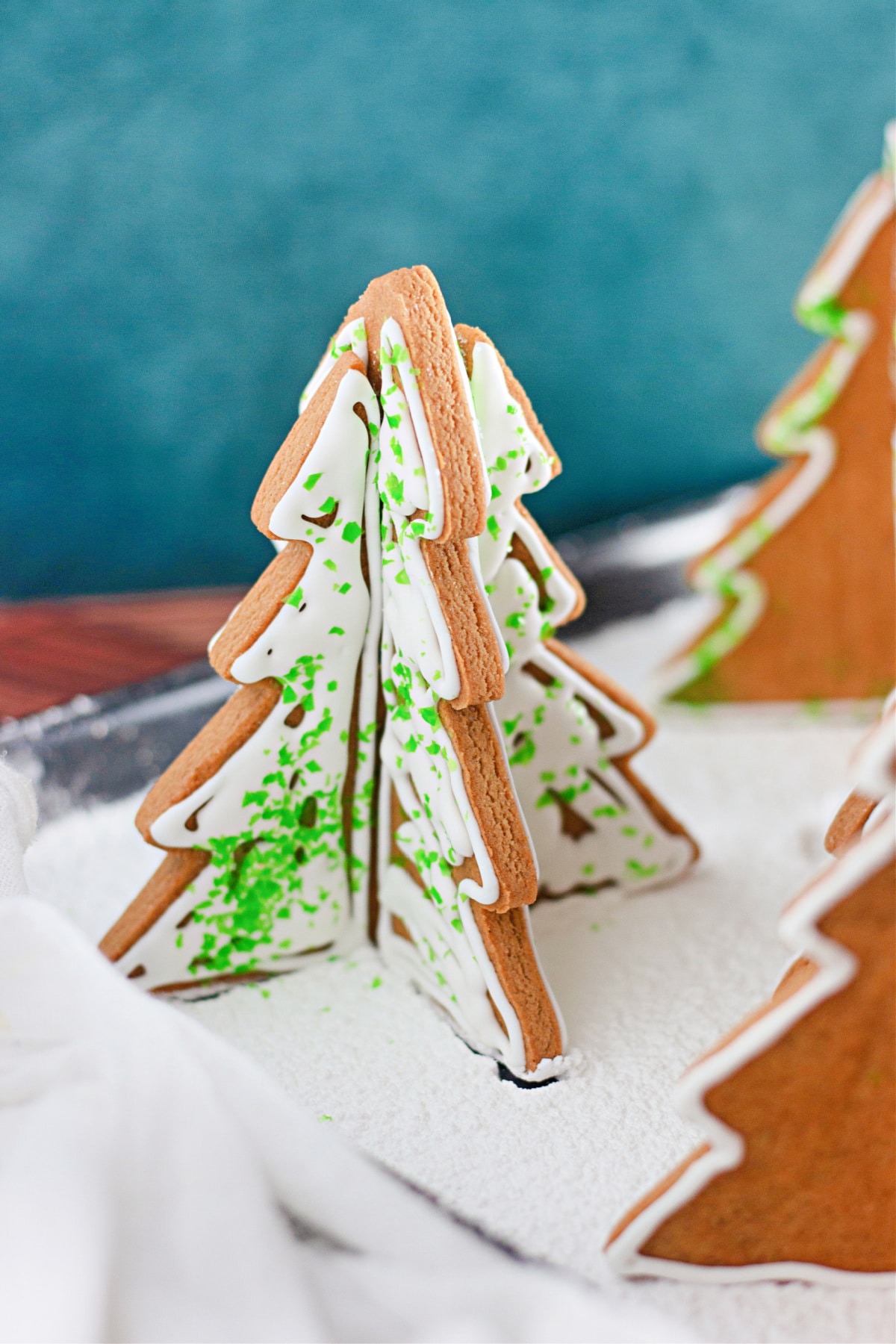gingerbread christmas tree decorated with royal icing.