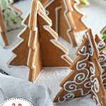 3d gingerbread trees on a baking sheet.