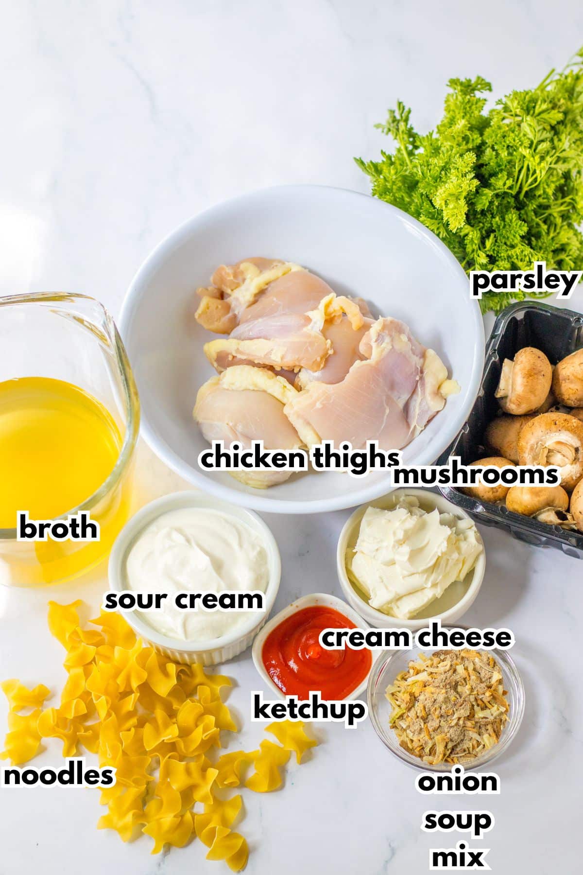 bowls of parsley, chicken thighs, broth, sour cream, cream cheese, ketchup, mushrooms, noodles, and onion soup mix.