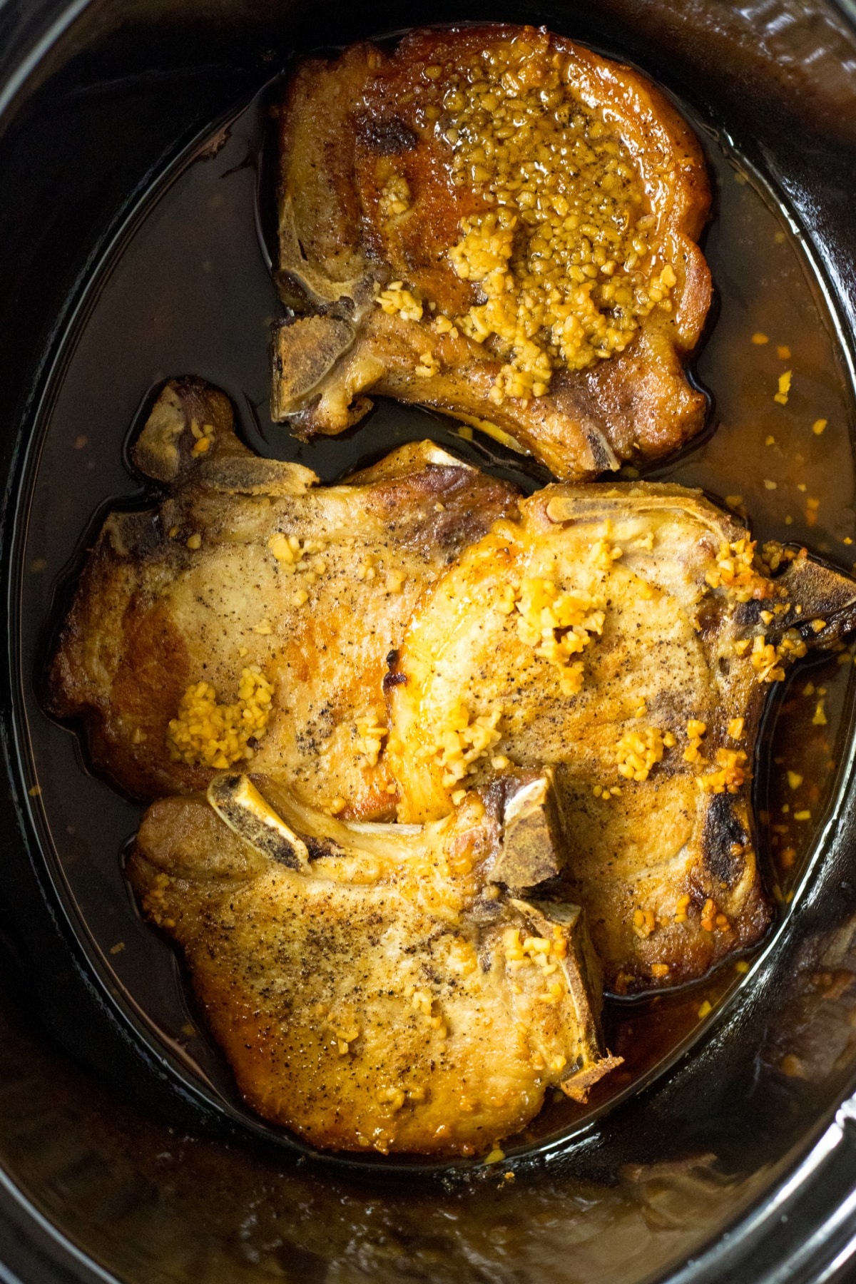 brown sugar pork chops in a slow cooker.