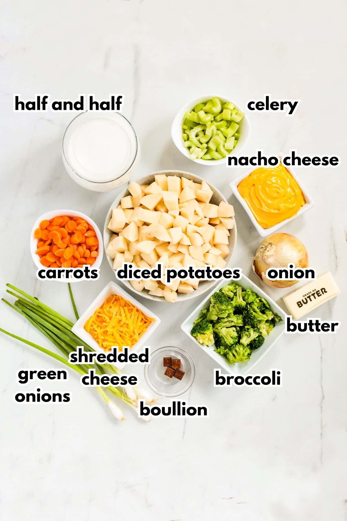 bowls of half and half, celery, nacho cheese, carrots, diced potatoes, onion, butter, shredded cheese, green onions, bouillon, broccoli, and butter.