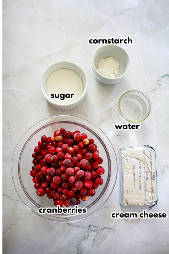 bowls of sugar, cornstarch, cranberries, water, and cream cheese.