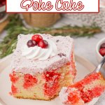 slice of cranberry poke cake on a small plate.