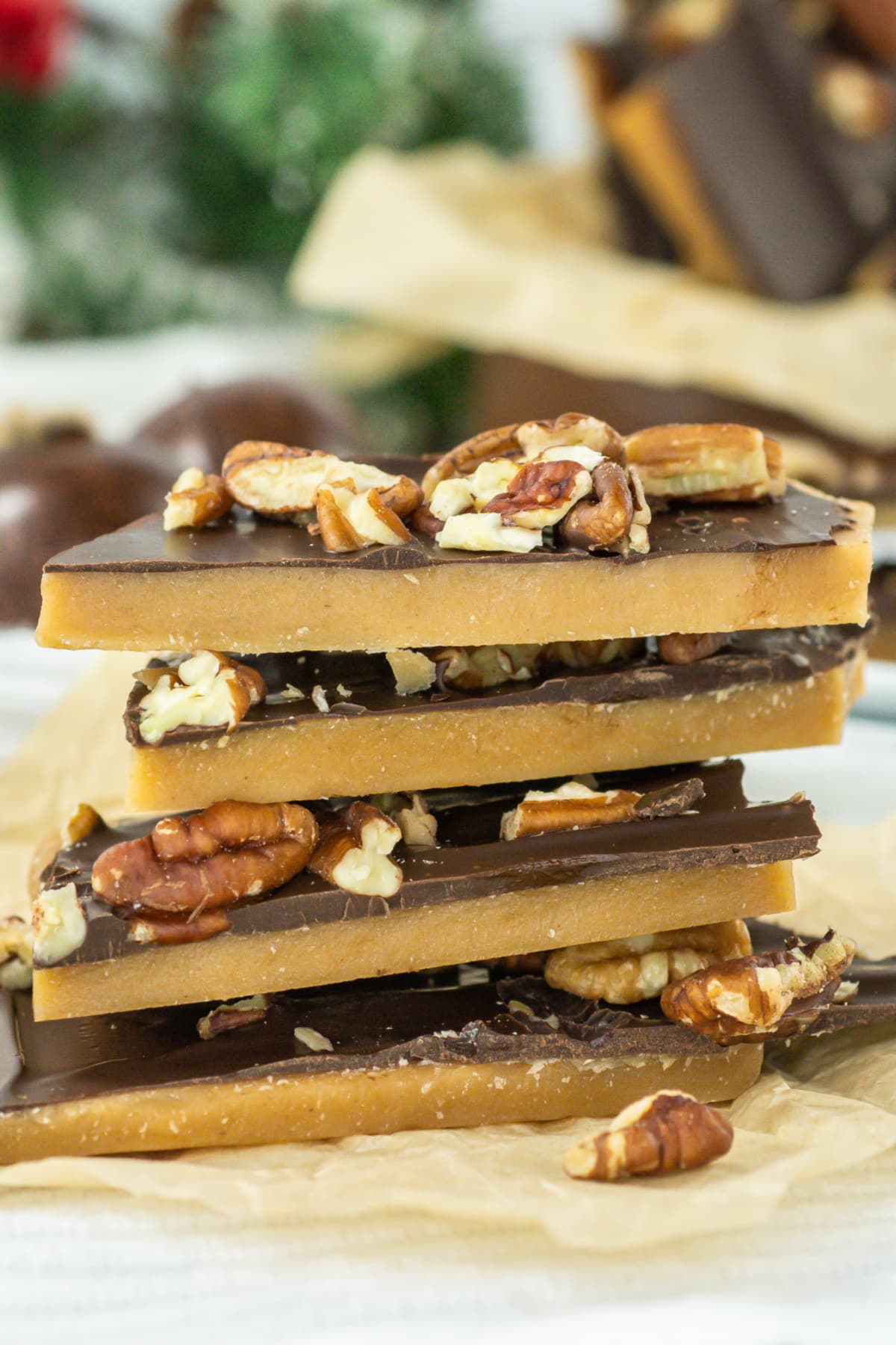 four pieces of english butter toffee on a kitchen towel.