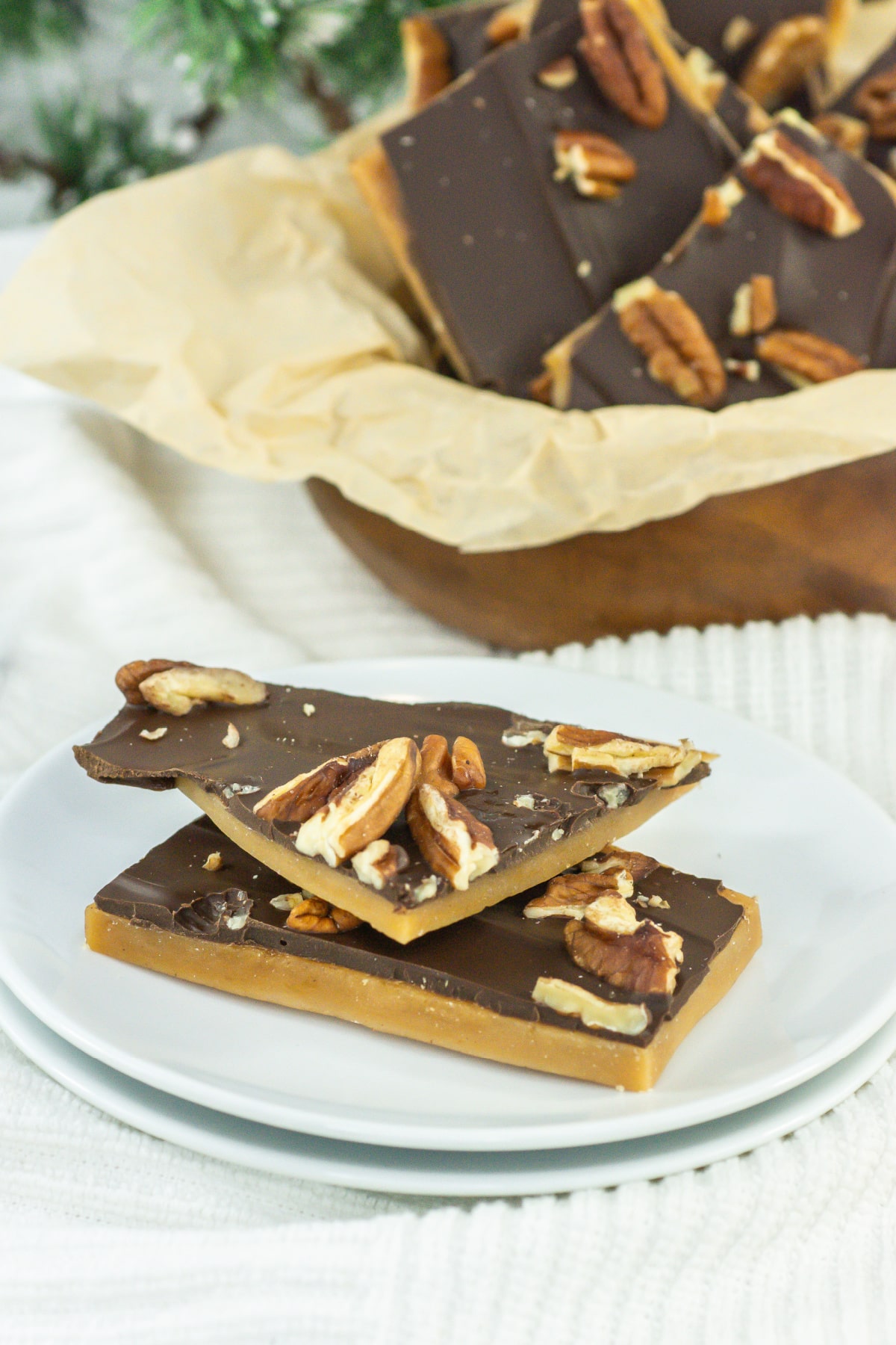 two pieces of english butter toffee on a small plate