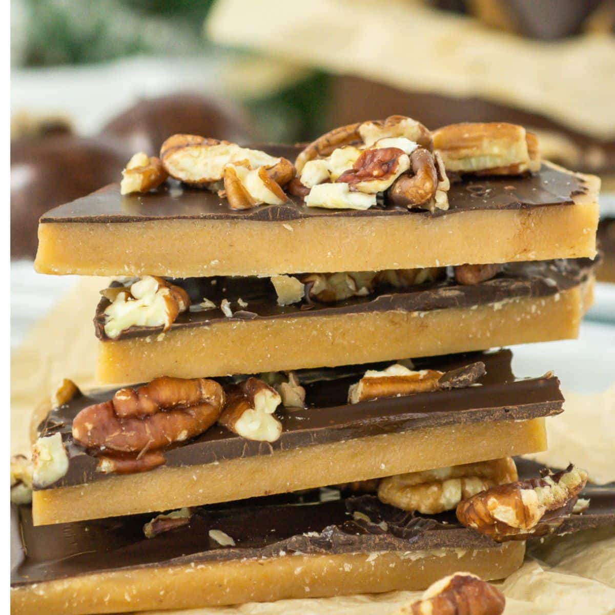 four pieces of english butter toffee on a kitchen towel.