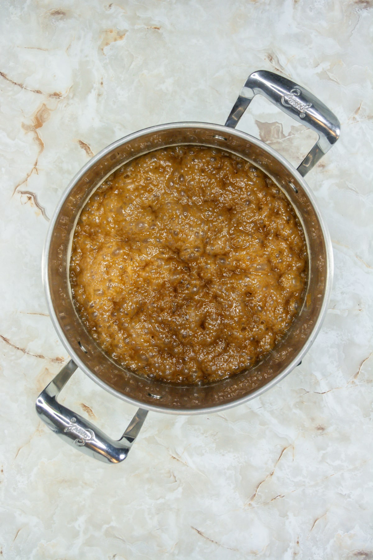 toffee mixture boiling in a large saucepan.
