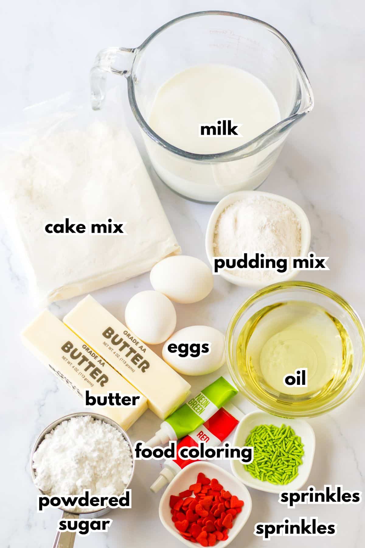 bowls of milk, cake mix, pudding mix, butter, eggs, oil, powdered sugar, food coloring, and sprinkles.