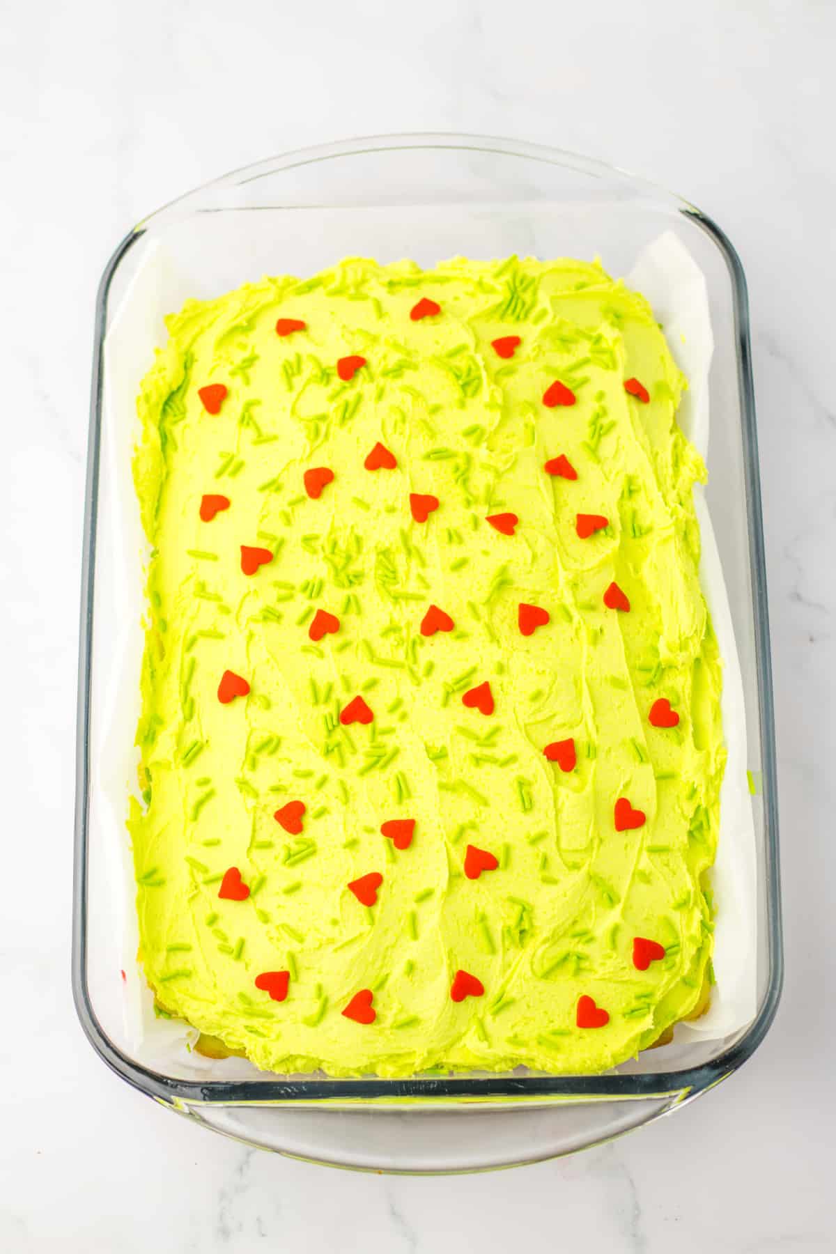 finished poke cake in a glass baking dish.